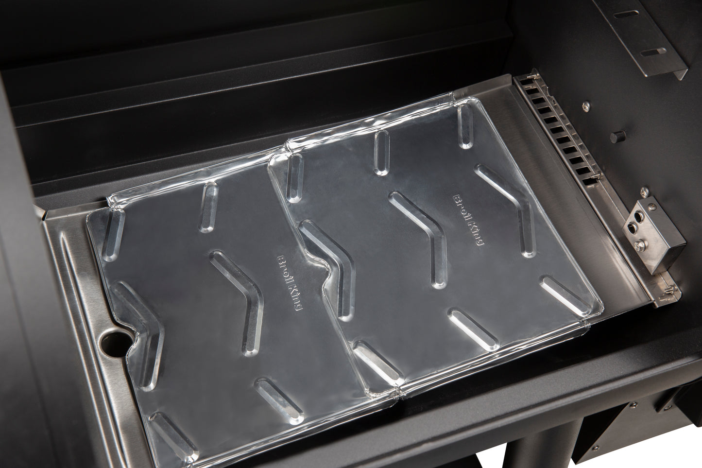 Droppskydd till pelletsgrill